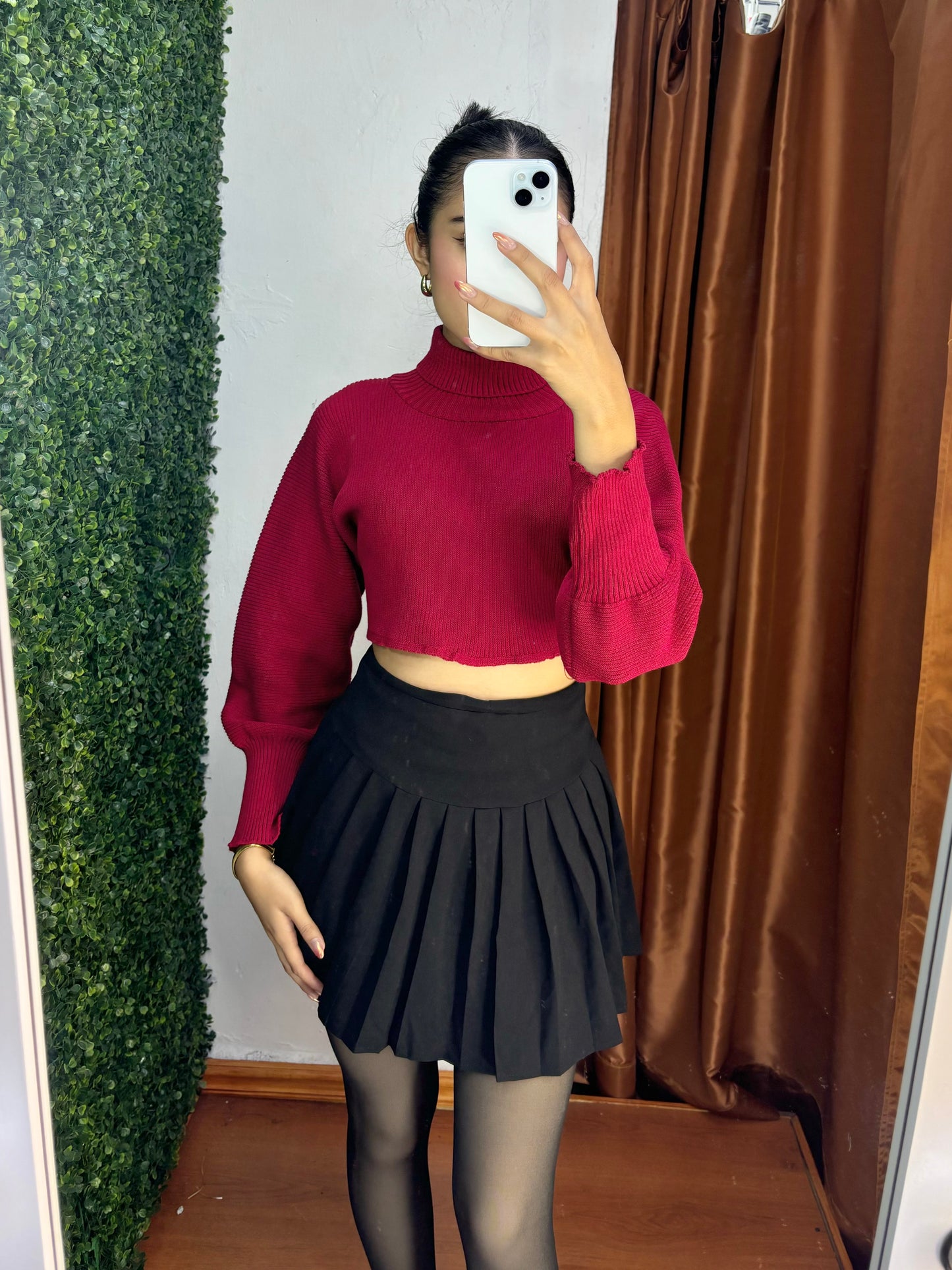 Suéter crop cuello alto